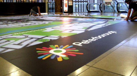 Advertising with vinyl floor graphics. What do you have under your feet? Carpet, tile, concrete, or wood? Even though every one of them is a good option, that floor might just be another great avenue to interact with your clients that you are not taking advantage of.
